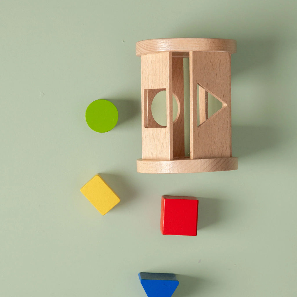 Cylinder Rolling Rattle Sorting Shapes